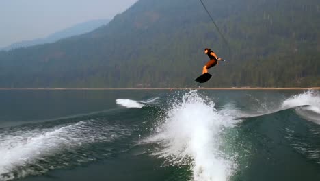 man wakeboarding in the river 4k