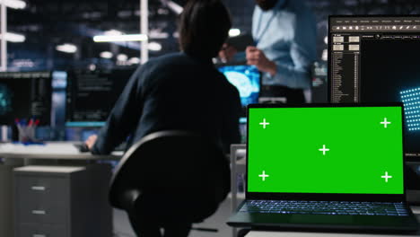 close up of isolated screen laptop in data center used by programmer managing ai