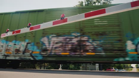 the train travels behind the railway barrier