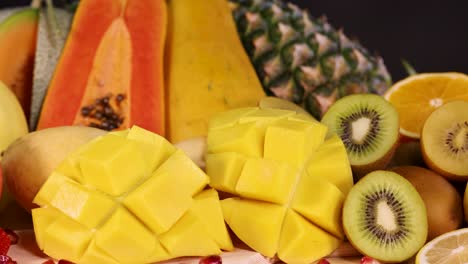 vibrant display of various sliced and whole fruits