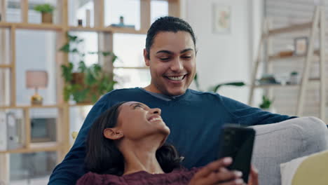 Phone,-talking-and-happy-couple-on-a-home-sofa