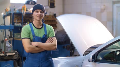 portrait of mechanic at garage