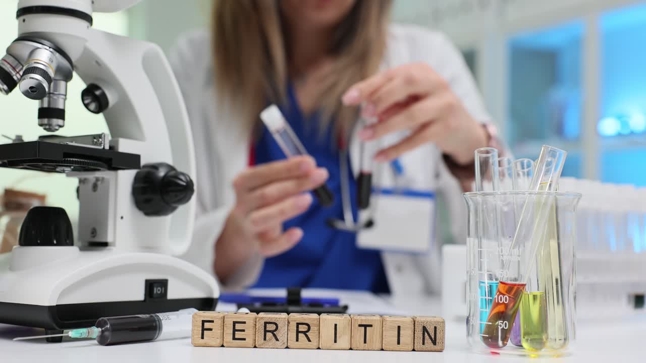Scientist analyzing ferritin samples in a medical laboratory