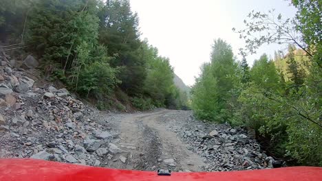 Following-4WD-vehicle-driving-on-trail-in-Poughkeepsie-Gulch-trail-of-the-San-Juan-Mountains-in-Colorado