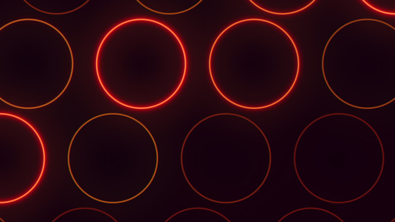 Seamless abstract footage of glowing red neon circles arranged in a repeating grid on a dark background, creating a modern futuristic tech pattern ideal for motion backgrounds and digital design
