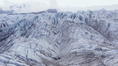 frozen ice glacier landscape in iceland, close up aerial