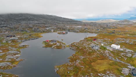 Aerial:-circulat-shot-close-of-a-lake-and-a-plateau-in-Bjornfell,-in-northern-Norway-and-close-to-Sweden