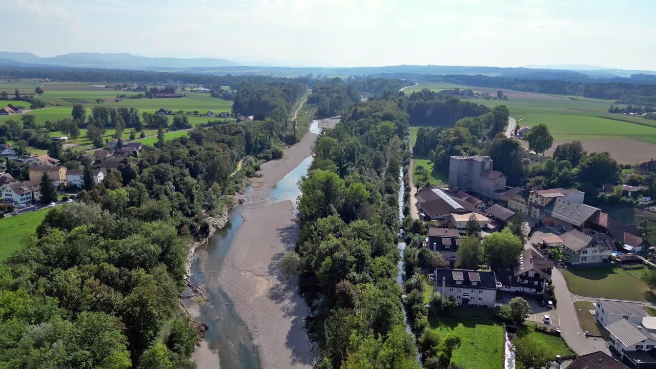 Drone flight with a DJI drone over the freshly renaturalized river Emme between B&auml;tterkinden and Utzenstorf at the entrance of the Emmental near Bern in Switzerland