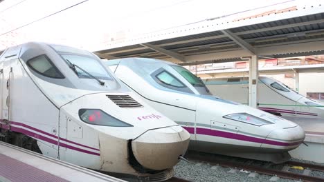 a view of renfe's high-speed ave trains on the platform at alicante station in spain.