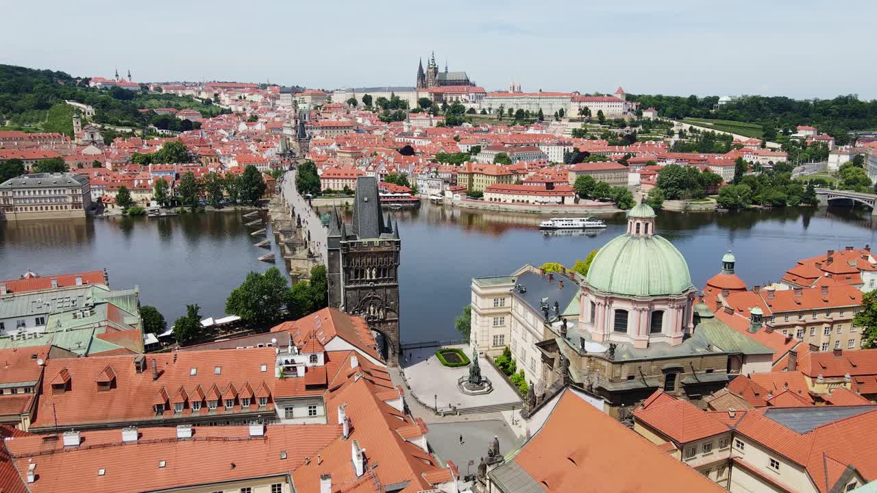 Stunning drone approach flying closer to Charles Bridge Old Town, Prague Czech