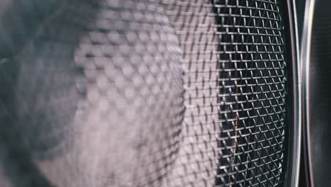 the movement of the vintage paper membrane of acoustic subwoofer speaker. bass vibration and playing