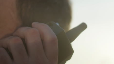 person using a walkie-talkie