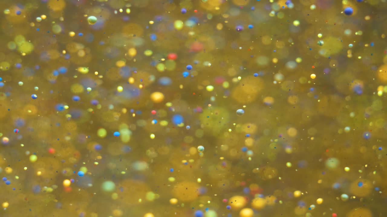 Slow Motion Bright Colors Bubbles Oil Beautiful Paint Universe Color Moving Multicolored Closeup. Acrylic Paint. Fantastic Surface. Abstract Colorful Paint Metamorphosis Structure Colorful Bubbles