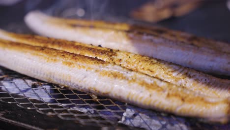 gomjangeogui, korean grilled sea eel on coals at korean barbecue, busan