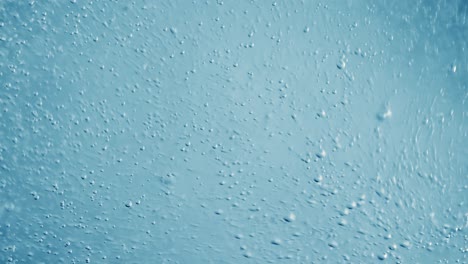 oxygen bubbles in water on a blue abstract background