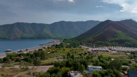 coastal turkish town with mountains and marina