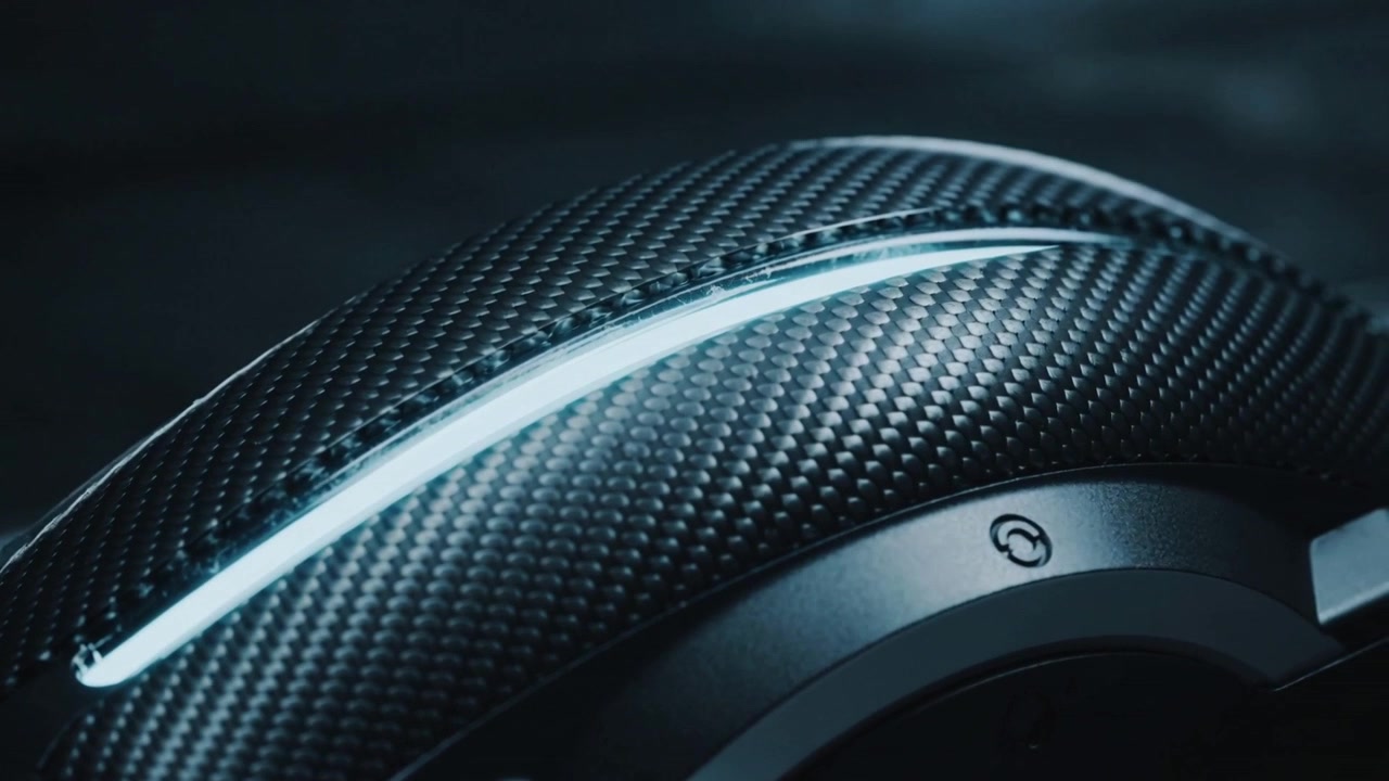 Pulling camera right and back, revealing carbonfiber shell in studio to show recessed LED strip