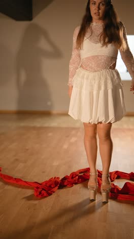 woman in a white dance costume