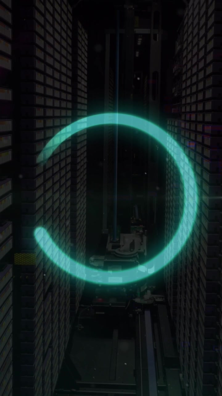 Animation of blue data loading ring and data processing over computer server room