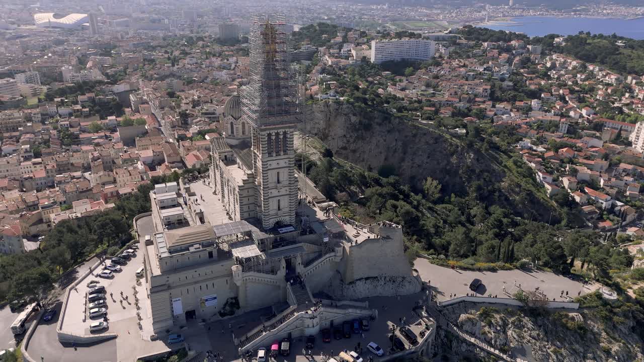 Drone circling Notre Dame de la Garde, view of sea, Marseille, landscape and more
