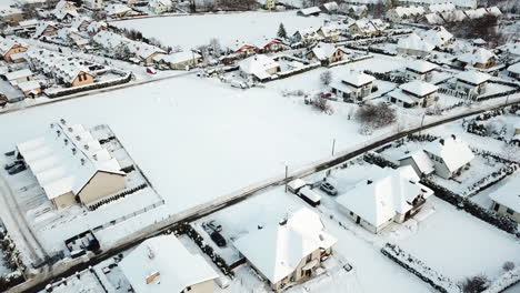 Drone-flight-over-city-in-Poland-during-winter-sunny-day