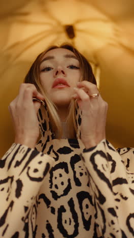 stylish woman in leopard print coat