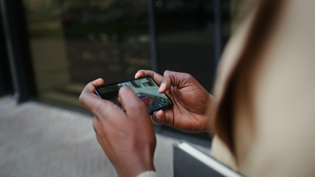 Playing a car racing game on a smartphone