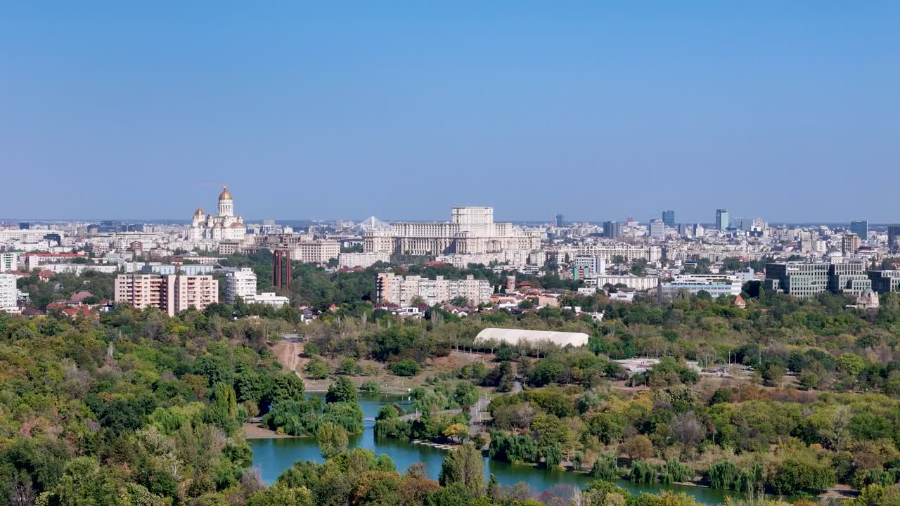 Rotating Aerial View Over Tineretului Park with Bucharest's Cityscape in the Background, Romania, Eastern Europe