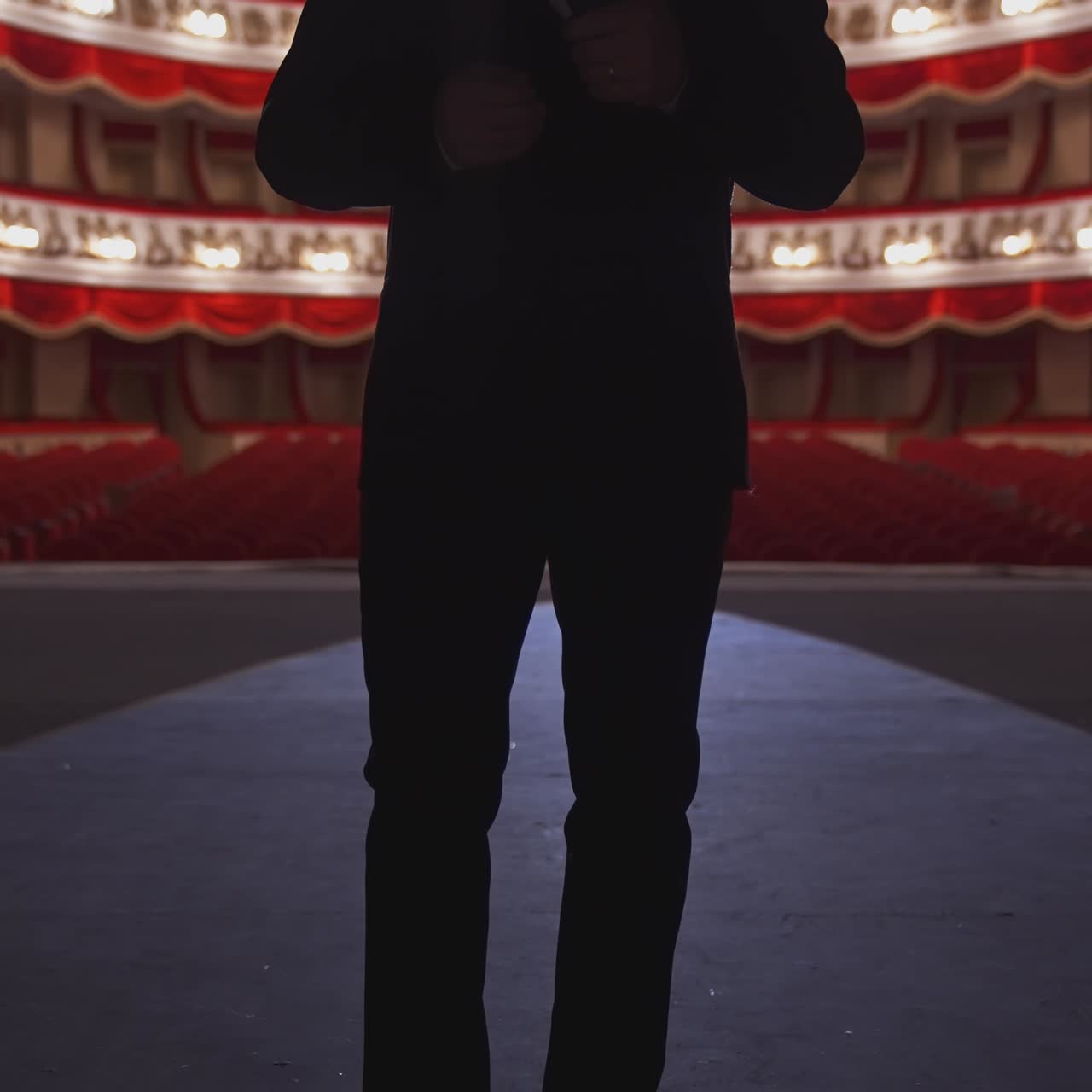 Actor in empty theater