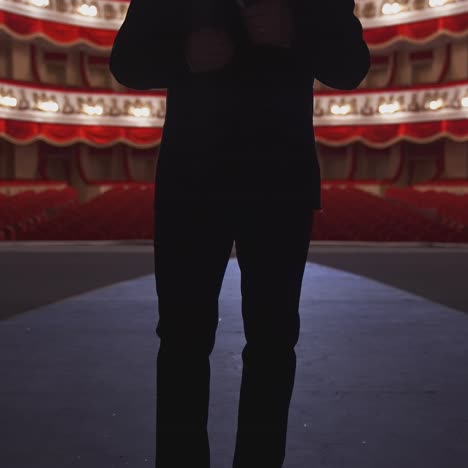 actor in empty theater