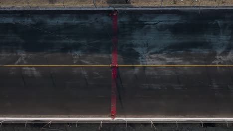 slow motion drone shot of a drag race finish line