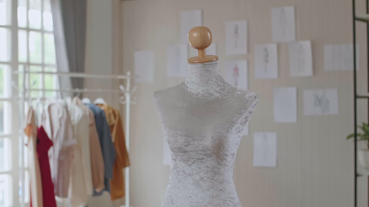 Fashion Design Studio Interior with Mannequin and Sketches