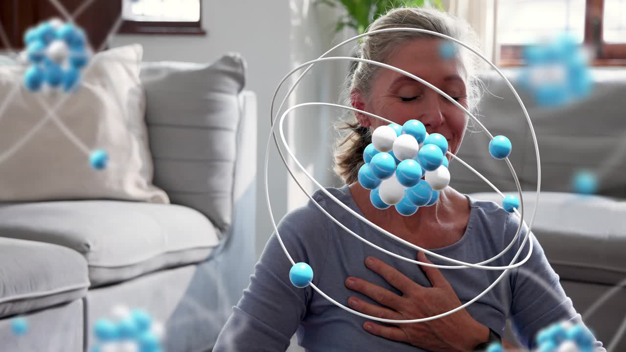 Senior woman pressing hand to chest and practicing wellness breathing at home, 3D atoms orbiting
