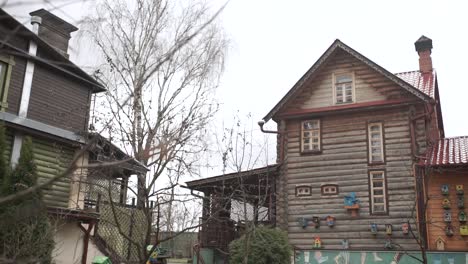 rustic wooden house with birdhouses