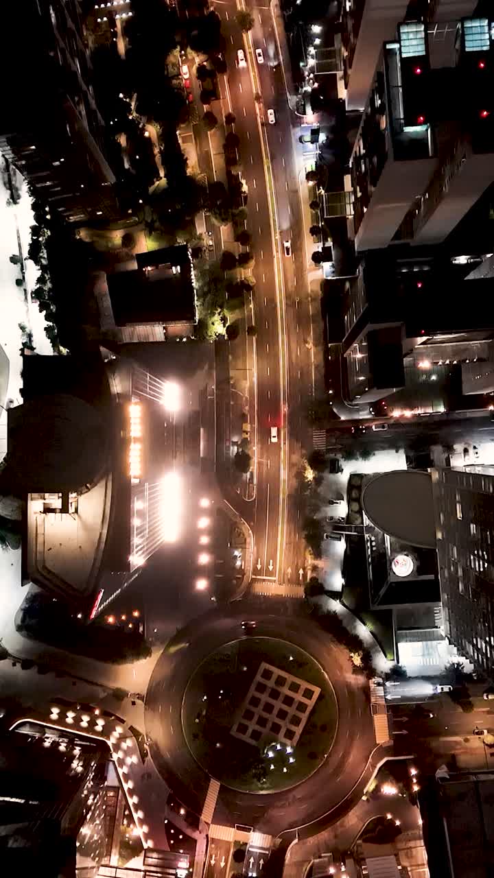 Aerial night views of Santa Fe CDMX with vertical drone