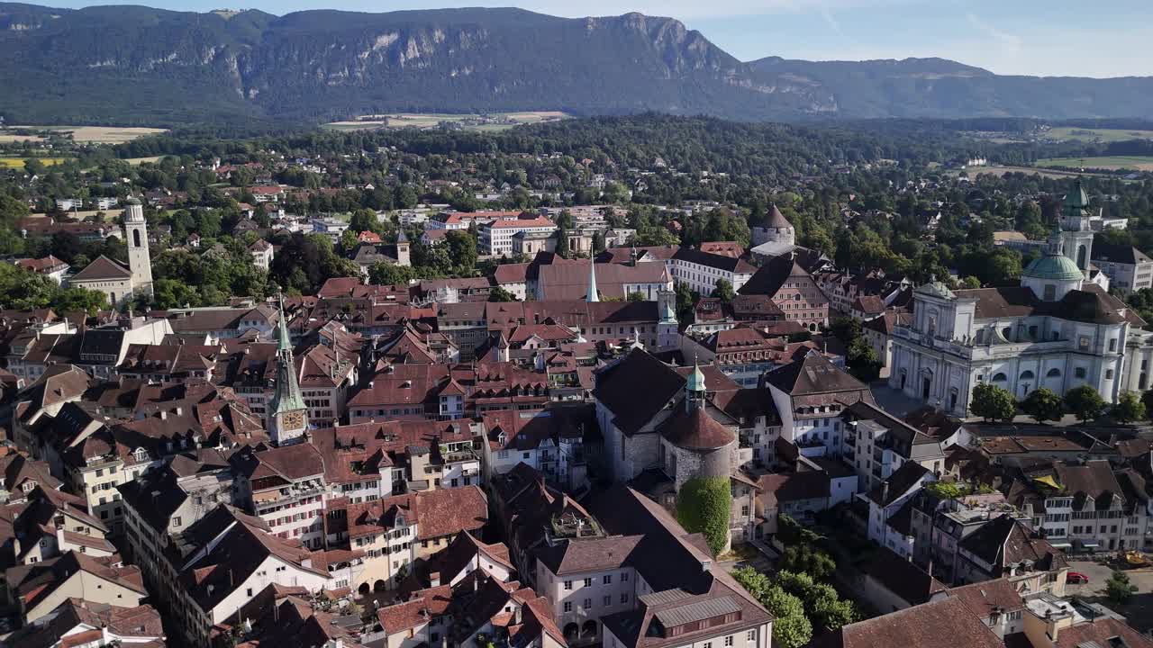 Aerial View of a Picturesque Town Surrounded by Mountains