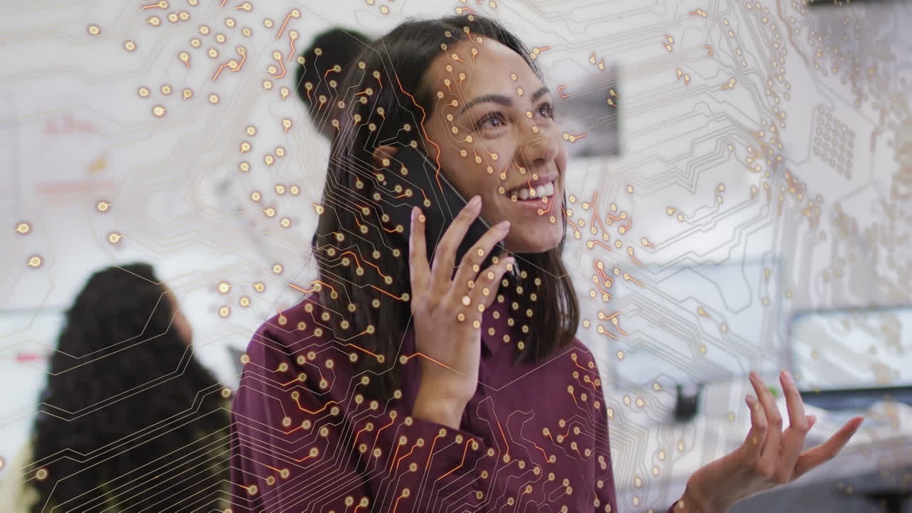 Animation of integrated circuit over happy caucasian woman using smartphone