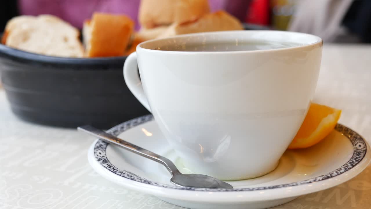 Tea and Bread at a Cafe