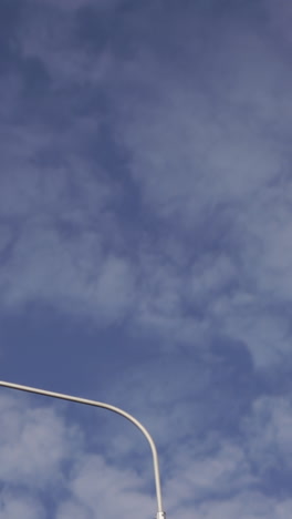 Street light against a cloudy sky