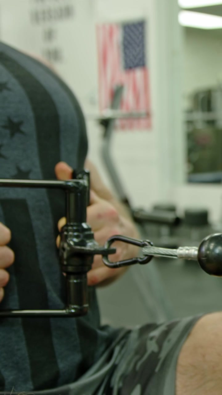 Strong bodybuilder strength workout in sport club