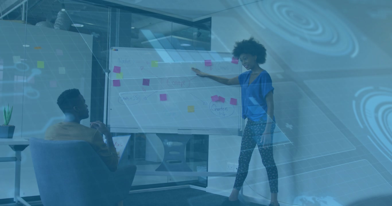 Presenter entering, placing notes on board, pointing clusters as peer mapping ideas in business