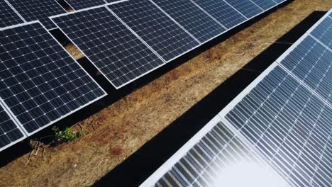 aerial view of solar panels array, solar power plant green energy concept, drone shot