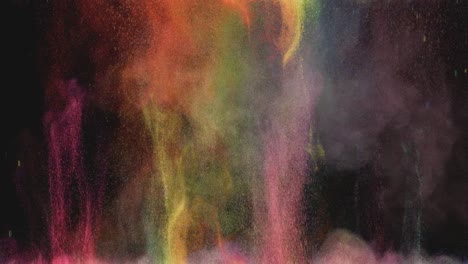 the beautiful colorful explosion of small particles. slow motion