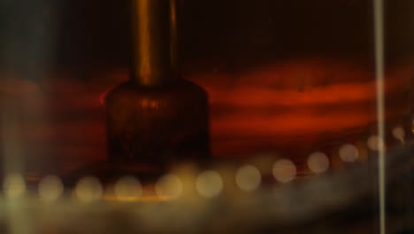 blurred image of tea or liquid in a container