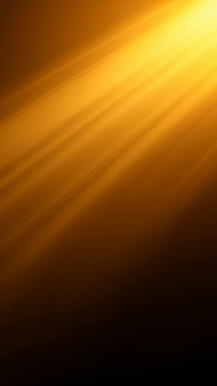 Vertical video: Activating dimmer, diagonal golden beams spreading across dark brown-black backdrop