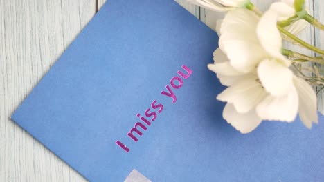romantic miss you card with flowers