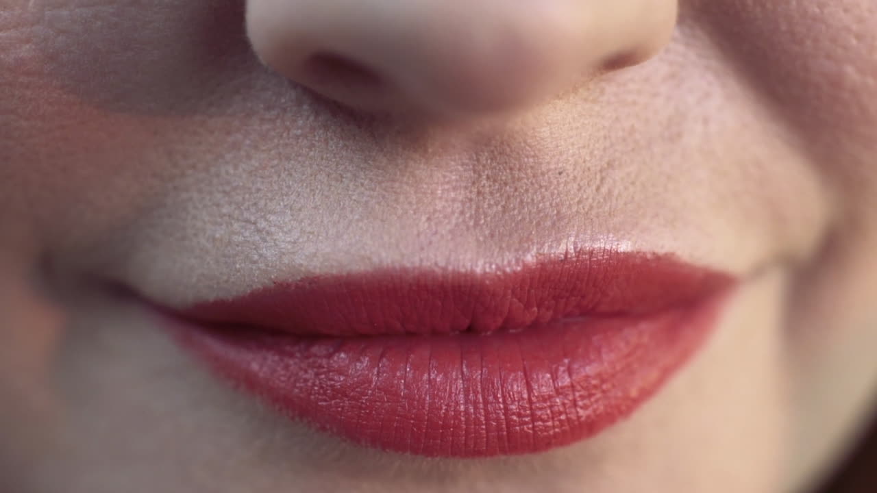 Woman eating an olive