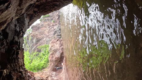 exploring a cave by the lake