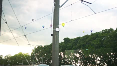 sky at sunset with flying aerostats. flying hot air balloons in the air