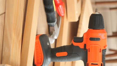 cordless drill on wooden furniture